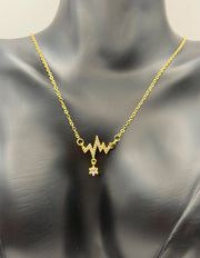 Modern luxury gold and crystal pulse statement necklace gift for her.