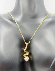Modern luxury gold and pavé crystal spiral statement necklace.