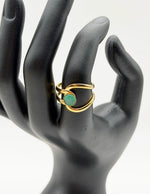 Modern luxury gold boho-chic sculptural jewelry turquoise ring.