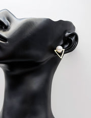 Everyday luxury fashion jewelry gold tone geometric studs by Biya Accessoires Dubai.