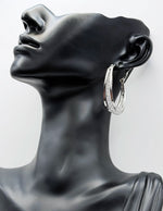 Multi-layered_gold_tone_fashion_earrings_for_everyday_luxury_in_Dubai_silver