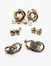 Biya Accessoires 6-pair gold earring set with pearl hoops and geometric studs.