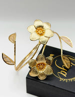 Non-tarnish 3D botanical wrap armlet for women Dubai luxury fashion.