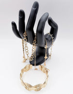 Non-tarnish gold statement bracelet set with clover charms for women Dubai.