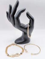 Non-tarnish gold tennis bracelet and heart bangle for women Dubai luxury fashion.
