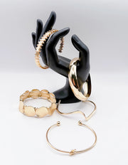 Hypoallergenic gold plated chunky dome cuff and geometric wave bangle United Arab Emirates.