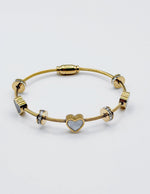Non-tarnish luxury gold and black enamel heart bracelet for women.