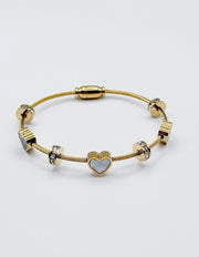 Non-tarnish luxury gold and black enamel heart bracelet for women.