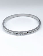 Modern luxury fine art editorial equestrian buckle bangle gift for her.