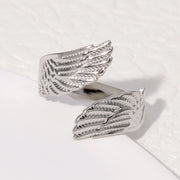Modern luxury fine art editorial silver jewelry wrap wing ring gift for her.