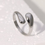 Modern luxury fine art editorial silver jewelry fluid metal ring gift for her.