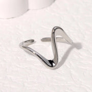 Modern luxury fine art editorial silver jewelry linear wave ring gift for her.