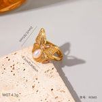 Modern luxury delicate gold and pearl butterfly ring gift for her.