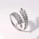 Modern luxury silver olive branch sculptural jewelry leaf ring gift.