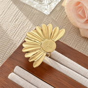 Modern luxury bold brushed gold daisy ring for women.