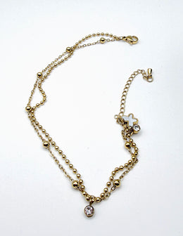 Hypoallergenic gold layered butterfly anklet with brilliant bezel-set cubic zirconia UAE.