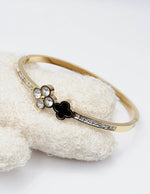 18K gold plated black onyx and crystal clover bypass bangle by Biya Accessoires gift for her