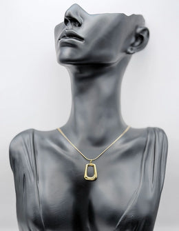 Waterproof gold hollow rectangle necklace on snake chain by Biya Accessoires.