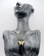 Waterproof non-tarnish artificial gold jewelry featuring a gothic cross pendant in Dubai.