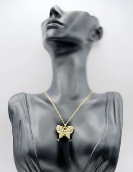 Waterproof non-tarnish artificial gold jewelry featuring a gothic cross pendant in Dubai.