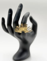 18K gold plated textured sunburst statement ring by Biya Accessoires.