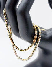 18K gold plated double chain tennis and cylinder bracelet by Biya Accessoires.