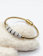 18K gold plated crystal pave snake chain bracelet by Biya Accessoires.