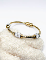 Waterproof gold magnetic clasp spaced charm bracelet for women Dubai.