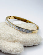 18K gold plated triple row pave crystal hinge bangle by Biya Accessoires.
