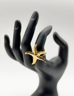 Waterproof gold organic sea star adjustable ring for women Dubai.