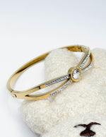 Modern luxury fine art editorial jewelry heritage solitaire bangle gift for her.
