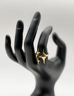 Waterproof gold triple star adjustable bypass ring for women Dubai.