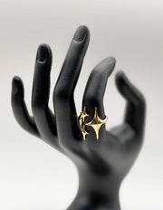 Waterproof gold triple star adjustable bypass ring for women Dubai.