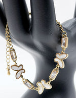 Waterproof gold white enamel insect charm bracelet for women Dubai.