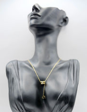 Waterproof non-tarnish artificial gold Y-necklace in a luxury green gift box.