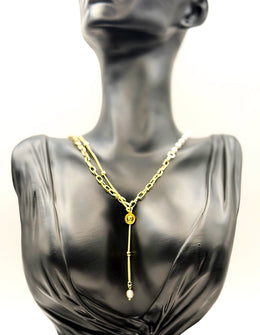 Biya Accessoires 18K gold plated layered lariat necklace with vintage coin and baroque pearl drop.