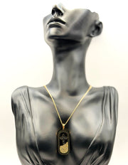 Biya Accessoires 18K gold plated tribal cross medallion necklace for men and women.
