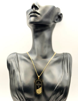 Biya Accessoires 18K gold plated tribal cross medallion necklace for men and women.