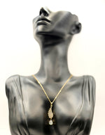 Close-up of premium hypoallergenic imitation jewelry featuring a crystal wing pendant.