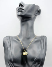 Biya Accessoires 18K gold plated open seashell necklace with pearl and pave crystals.
