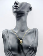 Waterproof non-tarnish artificial gold jewelry with clover and crystal pendants.