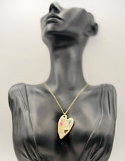 Close-up of premium hypoallergenic imitation jewelry featuring a hand-painted heart.
