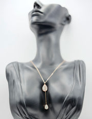 Close-up of premium hypoallergenic imitation jewelry featuring a crystal teardrop charm.