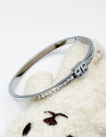 Waterproof silver geometric channel set square crystal bracelet for women Dubai.