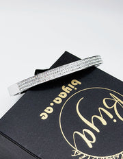 silver plated triple row pave crystal hinge bangle by Biya Accessoires.
