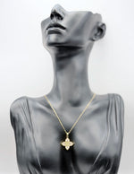 18K gold plated white quatrefoil clover pendant necklace by Biya Accessoires.