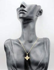 18K gold plated white quatrefoil clover pendant necklace by Biya Accessoires.
