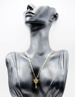 Waterproof gold key necklace with kinetic moving crystal Dubai.