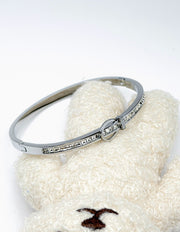 Hypoallergenic non-tarnish high polish silver hinge clasp bangle UAE.