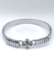 Hypoallergenic non-tarnish high polish silver rigid channel set bangle UAE.